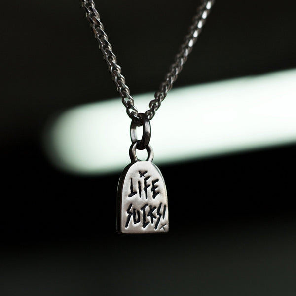 LIFE SVCKS PENDANT - Dirty Paradise